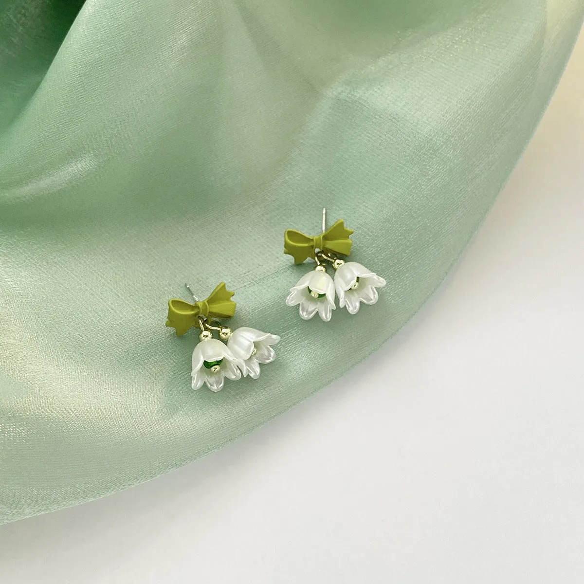 flower-bow-earrings-jlt11180